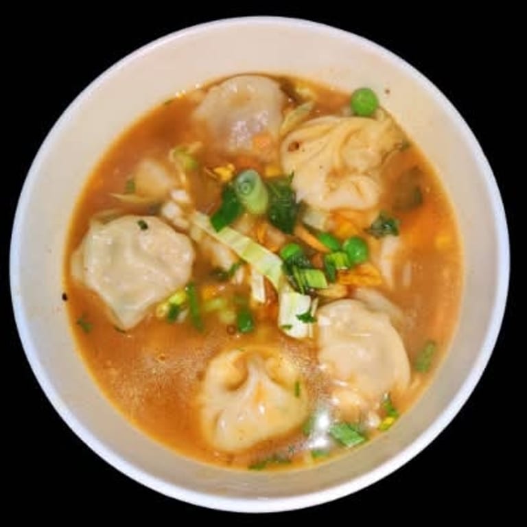 Spicy Jhol Momo: A Nepalese Delight